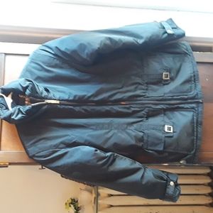 Obermeyer size 10 ladies Vera black ski parka with gold hardware cinched waist